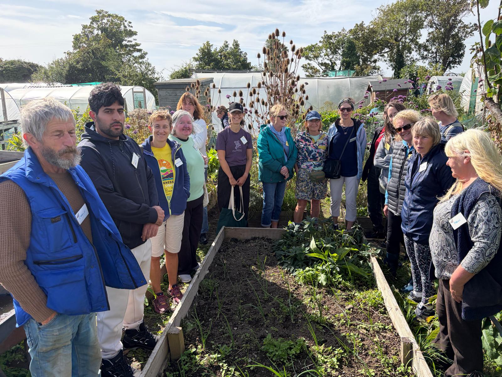 Soil, Seed and Soul course participants in the community garden